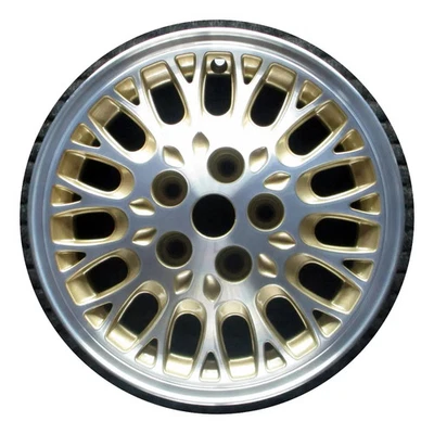 Llanta Chrysler Plymouth Town and Country Voyager 15 1993-1995 dorada OE 2027 Foto 1 de 4
