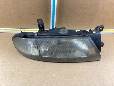 Conjunto de faros delanteros derecho del lado del pasajero Nissan Altima 1993-1997 OEM Foto 1 de 4