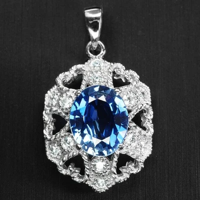 Inestimables colgantes de oro blanco de plata de ley 925 de 4,80 quilates con zafiro azul vivo Foto 1 de 4