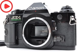 Canon AE-1 Program analoge 35-mm-Spiegelreflexkamera schwarzes Gehäuse aus... - Bild 1 von 14