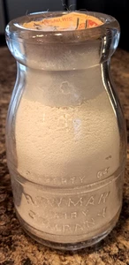 Bottiglia latte vintage CAPITOL DAIRY COMPANY rotonda in rilievo mezza pinta 1929 Chicago - Foto 1 di 4