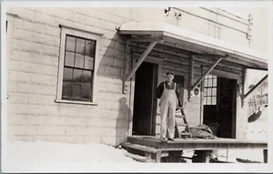 RPPC 1907 Man On Porch Of  Grain Store Passumpsic ,Vermont - Picture 1 of 2