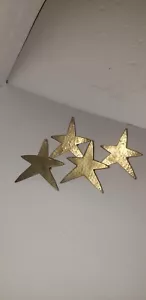 4 ANELLI TOVAGLIOLO STELLATO IN OTTONE MARTELLATO VINTAGE PRIMITVE PRIM CASALE SET 4 LUGLIO - Foto 1 di 6