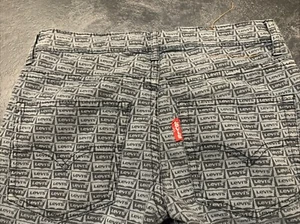 LEVI'S 512 Slim Taper Size 12 REG 27 X 25 STRETCH Jeans All Over Levi’s Print - Picture 1 of 9