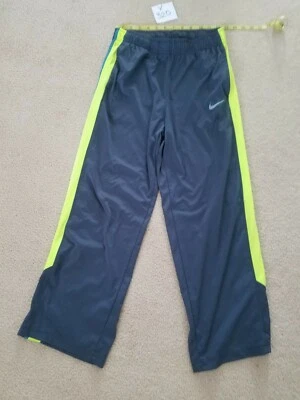 Pantalones de chándal NIKE DRI-FIT para niños/jóvenes talla grande azul oscuro y amarillo neón Foto 1 de 4