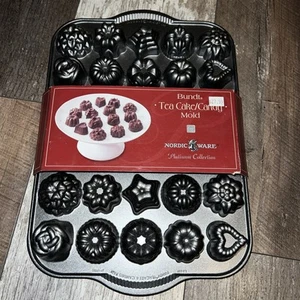 Nordic Ware Bundt Tea Cake and Candies Pan 2.5 Cup Hearts Stars Rosettes - Picture 1 of 3