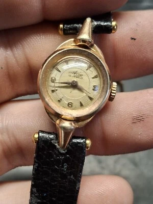 Reloj antiguo mecánico de cuerda manual Avia 15 Jewel para dama tono dorado años 50 Foto 1 de 4