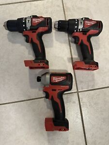 Milwaukee M18 2893-22CX (2) Hammer Drills and Impact Driver (Tool Only)