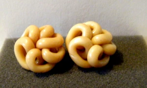 Vtg pair earrings celluloid extruded celluloid spaghetti design button shape 1"d - Picture 1 of 3