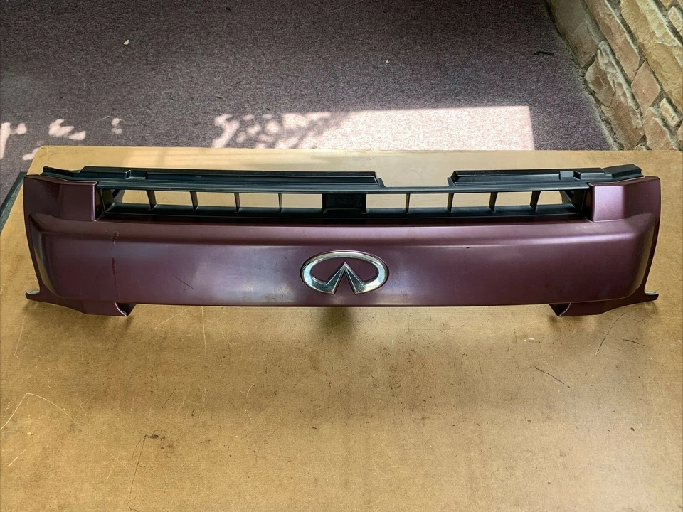 Infiniti QX4 2001-2002 parrilla superior delantera 62310-3W701 Borgoña Perla (rojo) OEM Foto 1 de 4
