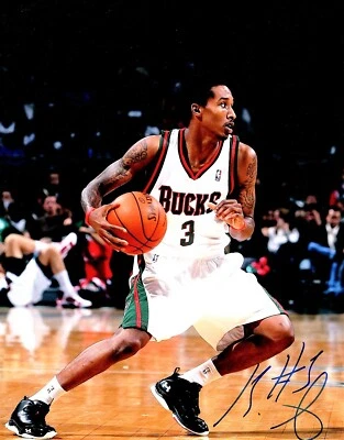 Brandon Jennings Signed - Autographed Milwaukee Bucks 11x14 inch Photo - Image 1 of 2