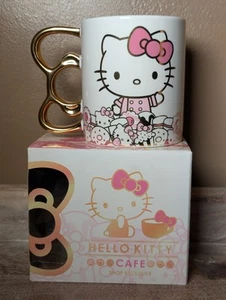 Tazza caffè Hello Kitty oro metallizzato fiocco manico rosa Irvine esclusiva 2021 Sanrio - Foto 1 di 8