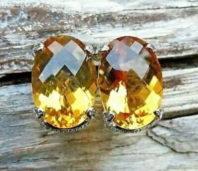 Aretes de oro blanco de 14 quilates solitario de citrino ovalados de 6 quilates con cierre trasero Omega Foto 1 de 4