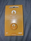 Paris Olympics 2024 Mustard Round Pin Badge Official Merchandise