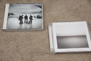 U2 - All that you cant leave behind & No line on the horizon CD Alben - Bild 1 von 3