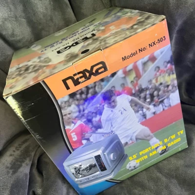 Brand New Naxa NX-503 5.5" portable black and white t.v. with am/fm radio - Image 1 of 4