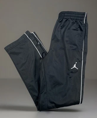 Pantalones deportivos de colección Air Jordan para niños talla M (10-12 años) negros a rayas blancas - Usados en excelente estado Foto 1 de 4