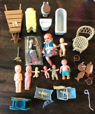 24 Doll House accessories, including bathroom furniture, babies, & kitchen items