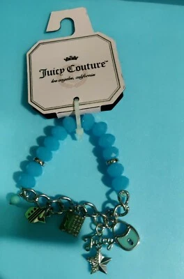 NUEVO CON ETIQUETAS JUICY COUTURE Pulsera Elástica Azul (Kohls) Cuentas, Cerradura, Estrella, Escudo, Dije Foto 1 de 2
