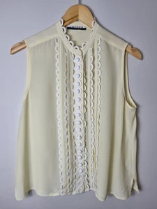 Camicetta Jaeger Vintage M Smerlata Pizzo Bottoni Senza Maniche Setosa Limone e Bianco - Foto 1 di 8