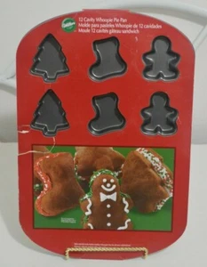 Wilton 12 Hohlraum Whoopie Kuchenform Weihnachtsbaum, Strumpf, Lebkuchenmänner - Bild 1 von 3