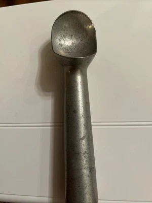 Cucharada de helado de aluminio PAPMERED CHEF retirada llena de líquido 2730 Foto 1 de 4