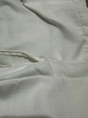 Fundas de cojín para sofá de exterior Pottery Barn Huntington blancas Foto 1 de 4