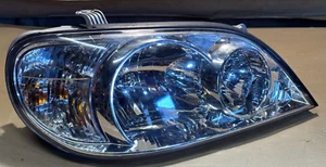 2002-2004 KIA CARNIVAL DRIVER SIDE FRONT RIGHT HEADLIGHT OK53A51020 - Picture 1 of 17