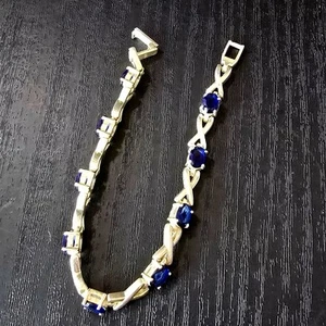 925 Sterling Silver Blue Spinel Xs and Ox 7" Bracelet - Picture 1 of 5