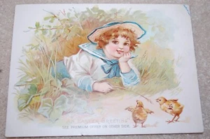 VINTAGE TRADE CARD SALUTO PASQUA RAGAZZA CHE GIOCA CON BABY PULCINI WOOLSON SPICE CO - Foto 1 di 6