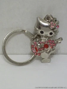 Llavero Hello Kitty Rosa Estrás Guitarra Plata Metal Llavero Bolso Dije - Imagen 1 de 9