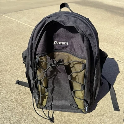 Canon Camera Bag Black & Olive Green Multi Pocket Zippered Clips Travel Backpack - Image 1 of 4