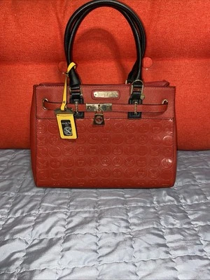 Nicole Lee Purse Brick Red/Black Embossed Polyurethane Purse & Charms. New (*) - Image 1 of 4