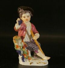 Antique Figurine Meissen Boy Siting and Holding Grapes Mint Condition.