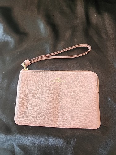 Portafoglio da polso Coach Blush in pelle rosa chiaro con cerniera sottile