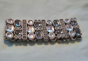 BRACCIALE ELASTICO IN PENSIONE LIA SOPHIA " BOMBONIERA " TONO ARGENTO - Foto 1 di 5