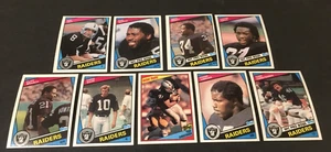 LOTTO 9 SQUADRA DI CALCIO LOS ANGELES RAIDERS 1984 TOPPS PRUITT GUY CHRISTENSEN BRANCH - Foto 1 di 1