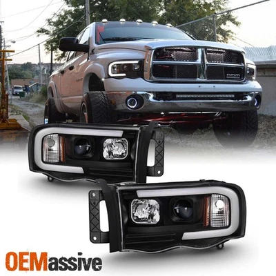 For 02-05 Dodge Ram 1500 | 03-05 2500/3500 Light Bar Projector Headlights Black - Image 1 of 4