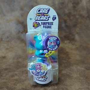Care Bears Peel and Reveal Surprise Sammelfigur Serie 1 blau/lila - Bild 1 von 4