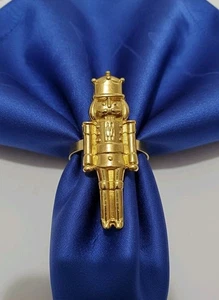 6 goldfarbene Nussknacker Serviettenringe Neu - Bild 1 von 2