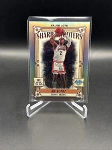 2024-25 Bowman Chrome U Sharp Shooters Caleb Love SS-11 rifrattore - Foto 1 di 2