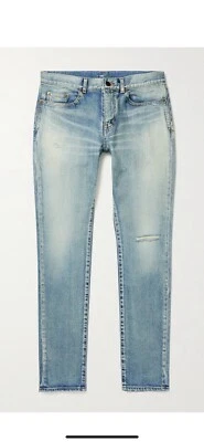 Saint Laurent Men’s Slim Ripped Knee Blue Jeans. 33. $790 - Image 1 of 4