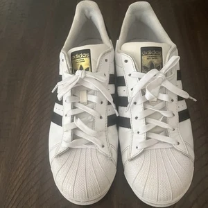 Adidas Superstar weiß/blau Streifen mit goldenem Schriftzug Herrengröße 10 - Bild 1 von 8