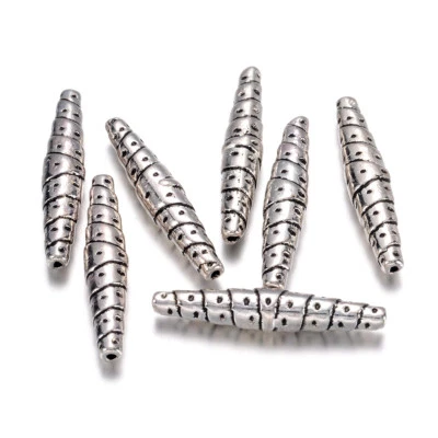 20 Tibetan Alloy Shuttle Metal Beads Bumpy Bullet Loose Spacers Nickel Free 25mm - Image 1 of 2