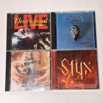 4 Classic Rock Pop CDs Eagles George Thorogood LIVE Styx Madonna LOT Foto 1 de 2