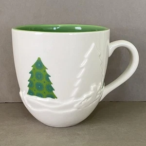 Starbucks 16 fl oz Mug ~3D Kids Playing in Snow & Green Trees ~ Coffee Tea Cocoa - Picture 1 of 12