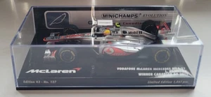 Minichamps 1:43 McLaren Mercedes no. 127 MP4-27 2012 Lewis Hamilton Canadian GP - Picture 1 of 3