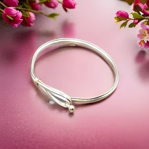 Brazalete Tiffany & Co de plata esterlina, oro de 18 quilates gancho y lazo amor - Imagen 1 de 6