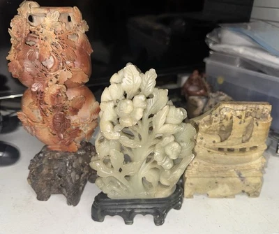 ¿Jade antiguo tallado a mano? Estatuas de piedra de jabón Foto 1 de 4