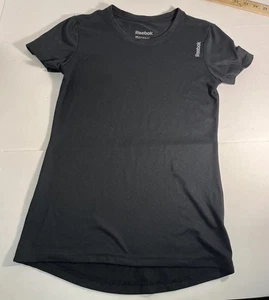 Schwarzes Damen-T-SHIRT REEBOX. GR XXS. Kurzarm Neu ohne Etikett. Speedwick Long Tail - Bild 1 von 9